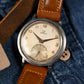 Omega 2180 - Salmon "Sector" dial w/ unpolished case.