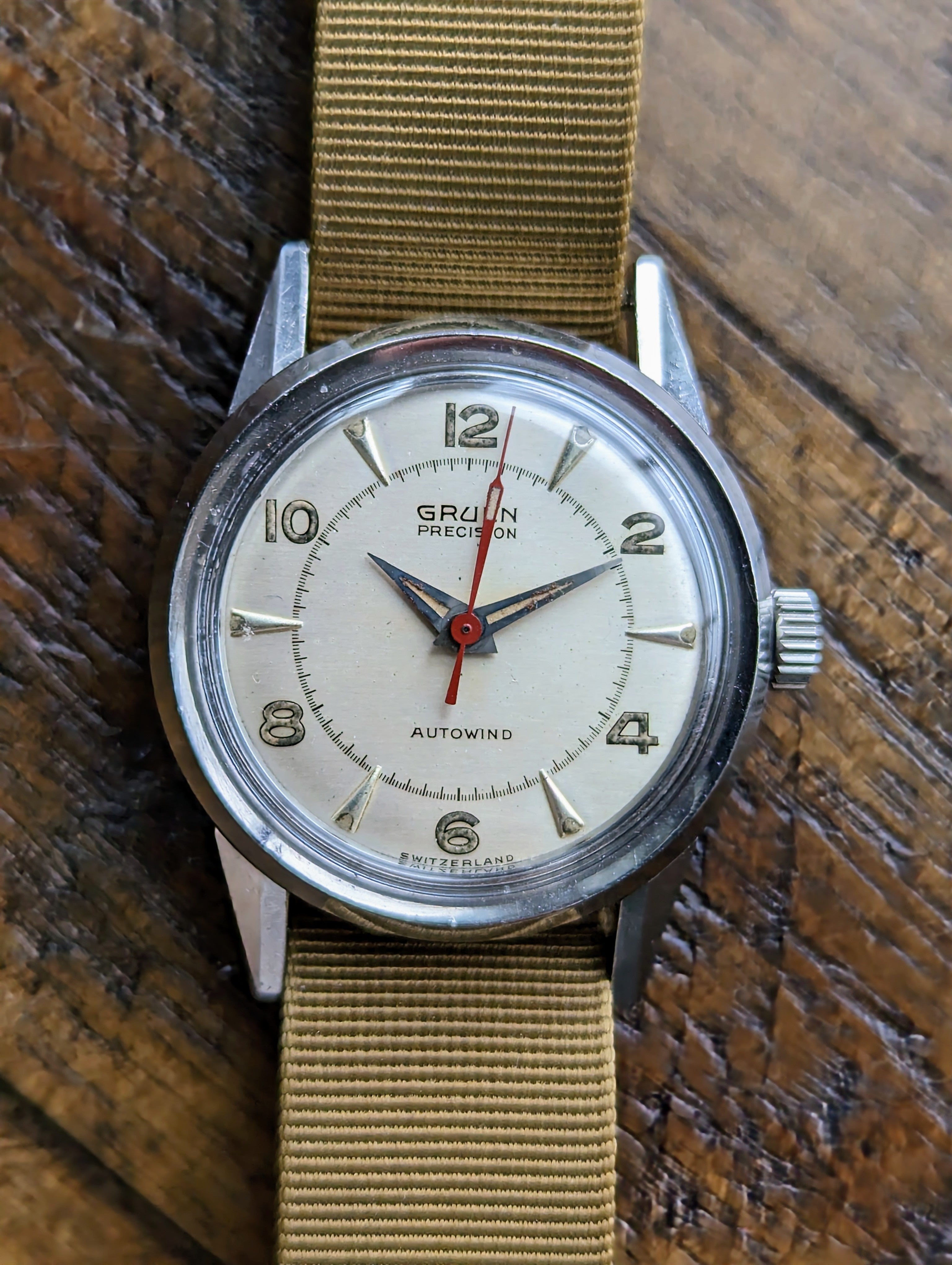 Lot - JEWELRY: Vintage man's 14K Gruen Precision wristwatch, stemwind and  set movement, stamped 