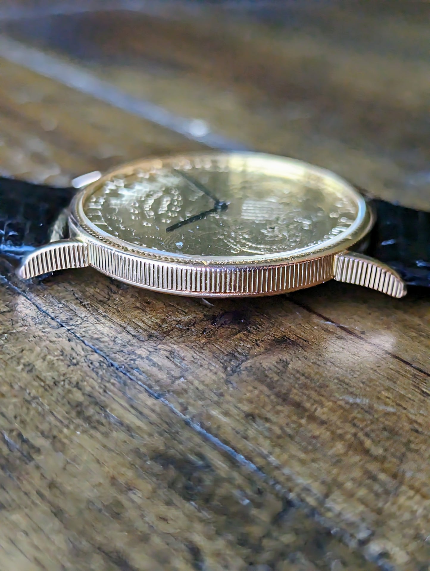 Corum 18kt yellow gold coin mechanical watch