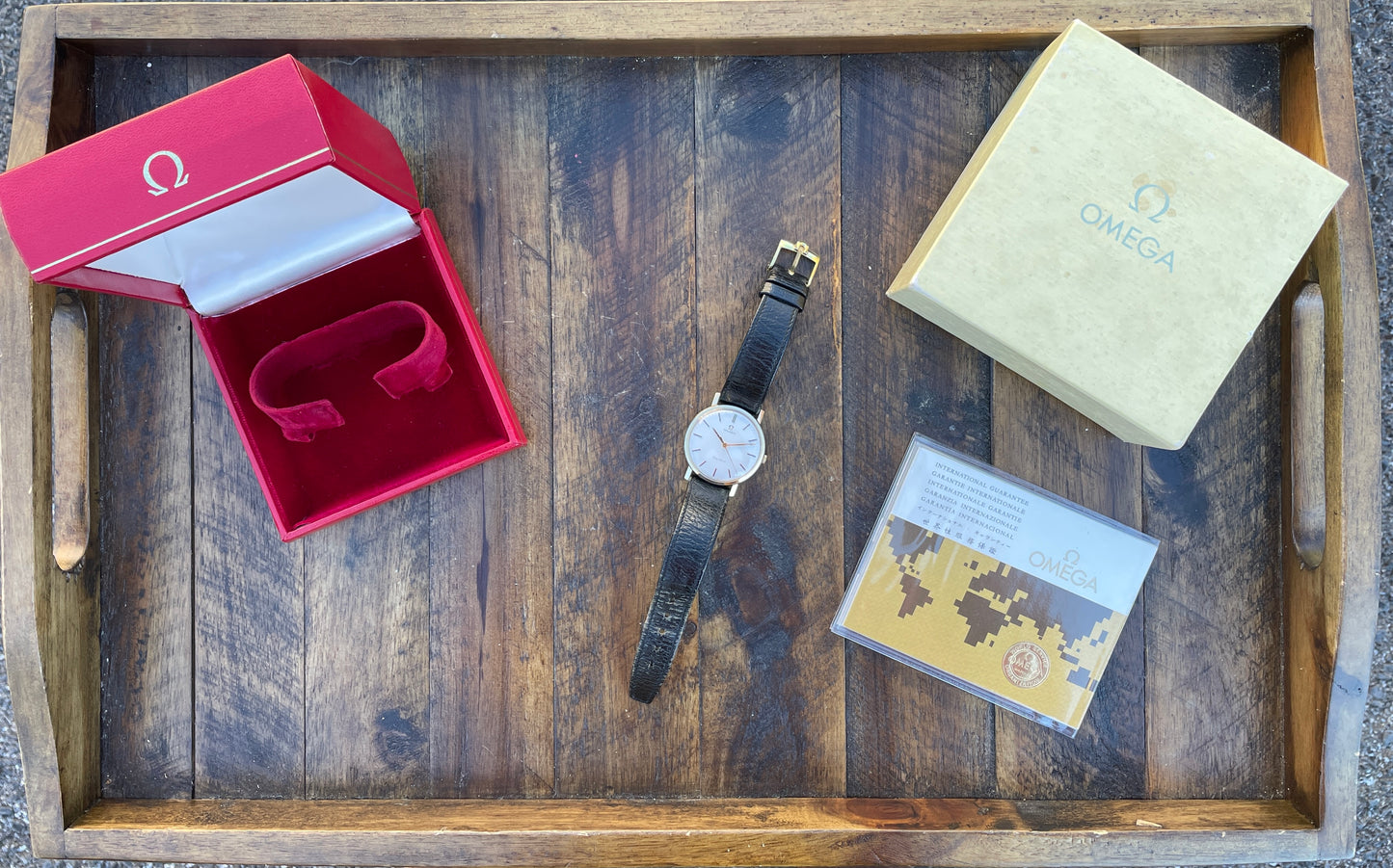 Omega Geneve - Original box, papers, band and buckle.